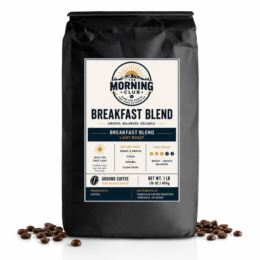 A 1 lb bag of Morning Club Breakfast Blend light roast coffee, displayed on a white background with scattered coffee beans at its base.