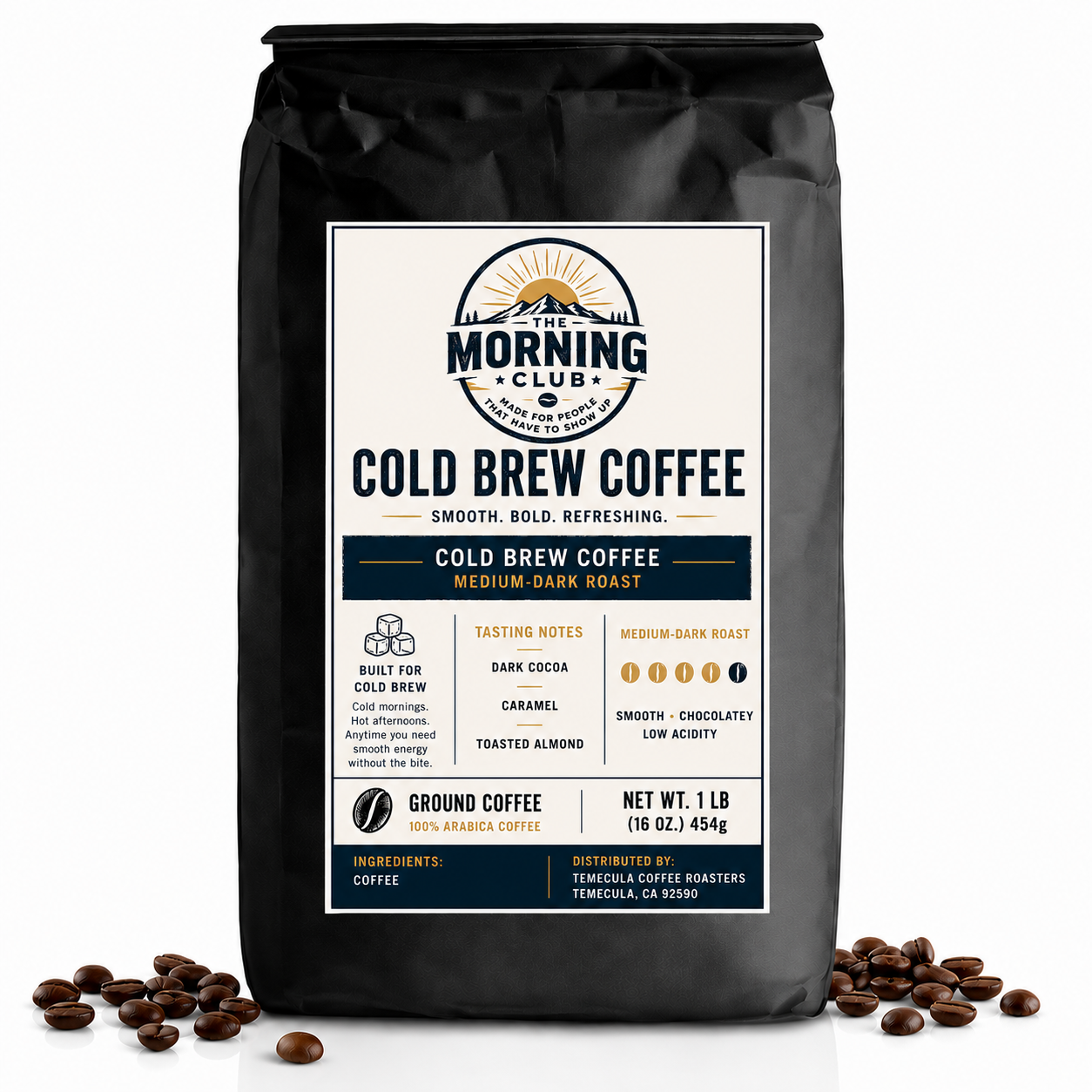 A 1 lb bag of Morning Club Cold Brew Coffee medium-dark roast coffee, displayed on a white background with scattered coffee beans at its base.
