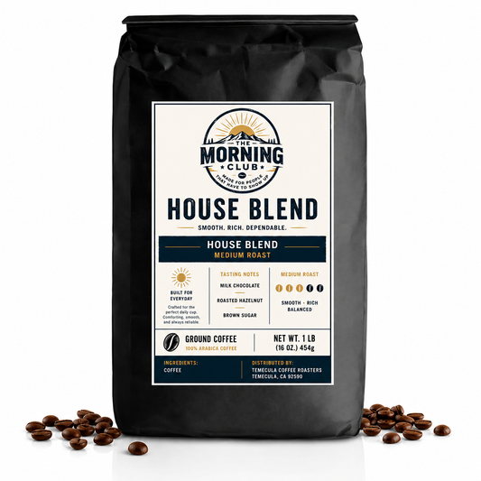 A 1 lb bag of Morning Club House Blend medium roast coffee, displayed on a white background with scattered coffee beans at its base.