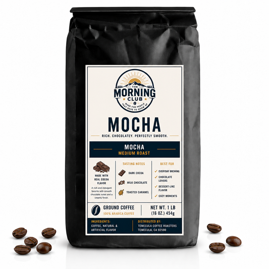 1 lb bag of Morning Club Mocha flavored coffee, medium roast ground coffee with rich chocolate flavor on a white background with scattered coffee beans.